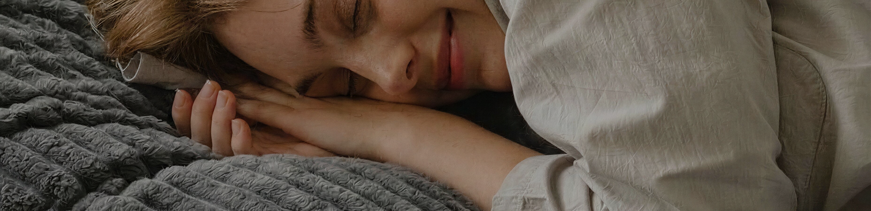 woman laying on the blanket